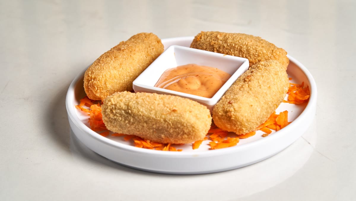 Golden croquettes with dipping sauce
