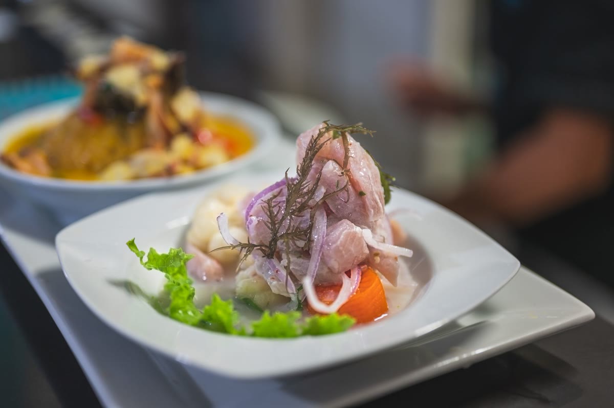 Raw fish dish with colourful garnish